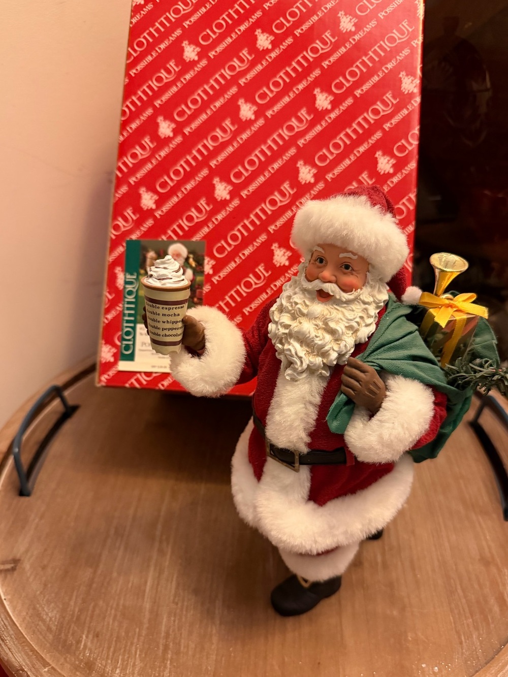 Possible Dreams Clothtique Santa figurine titled "To Go" (Item #57.71273)